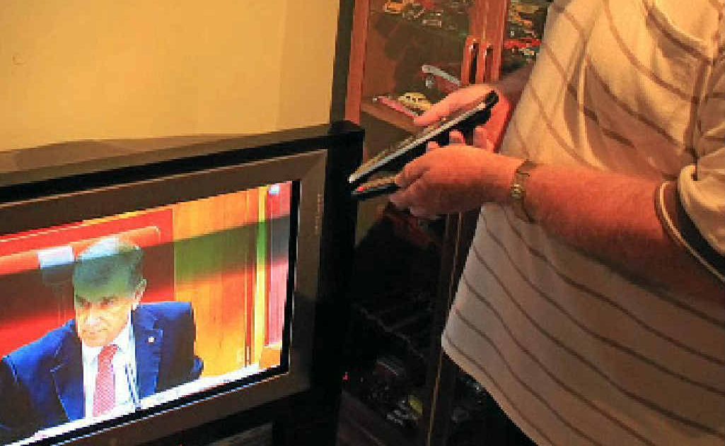 Vice President of the Warwick Senior Citizens Mr Mick Mceniery braces himself to make the switch to digital television.